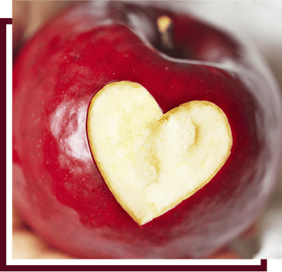 apple with a heart bite